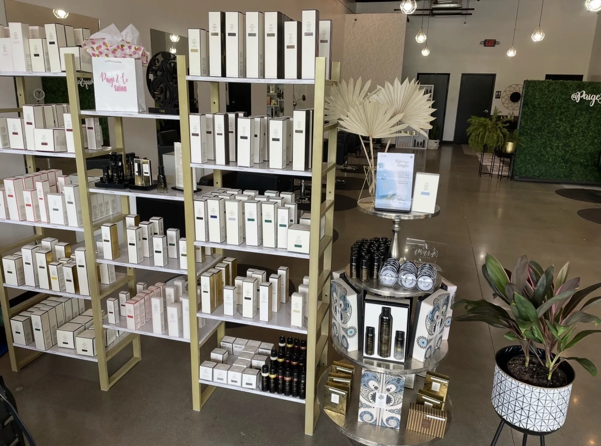 The Paige & Co. Salon — Oribe retail shelves and styling floor